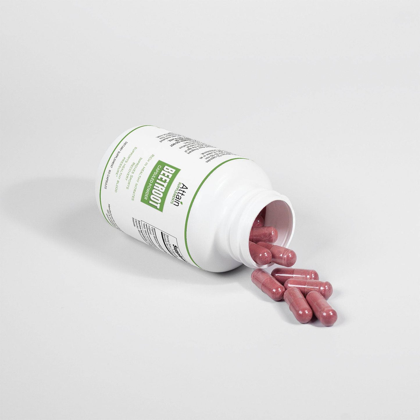 Beetroot Capsulated Powder in Bottle - laying down